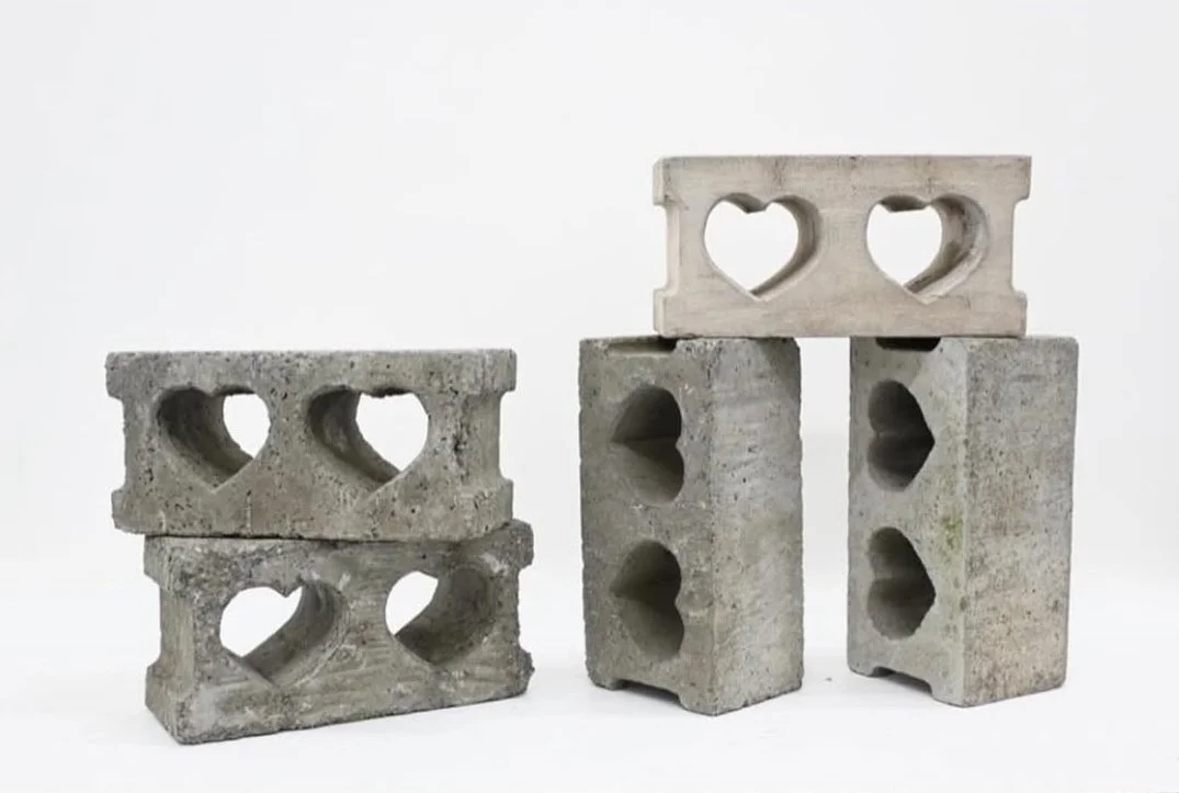 Concrete blocks with heart-shaped cutouts - studio view